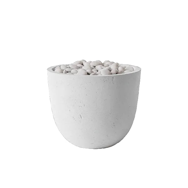 White textured planter with small stones on a black background