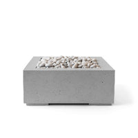 Concrete fire pit table with pebbles on a white background
