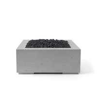 Concrete fire pit with black coals on a white background
