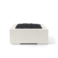 Concrete fire pit with black coals on a white background
