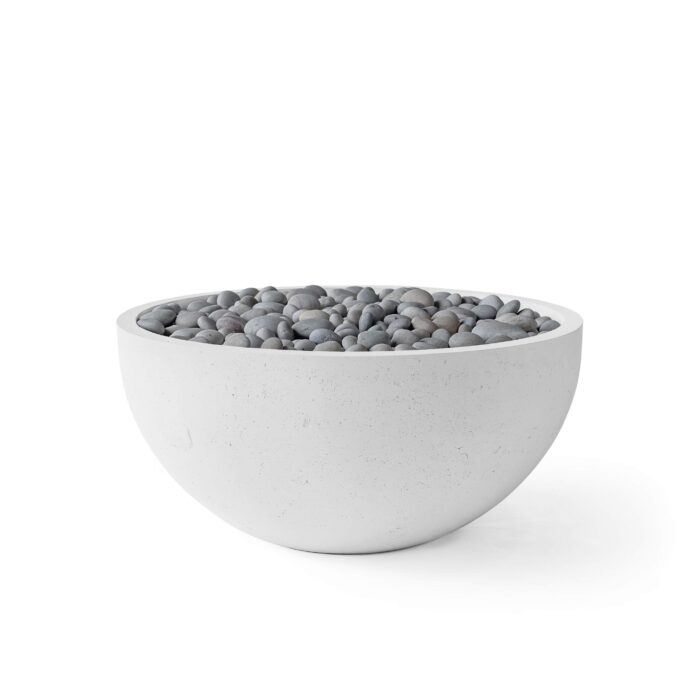 White bowl filled with gray pebbles on a white background