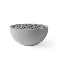 Concrete bowl filled with pebbles on a white background