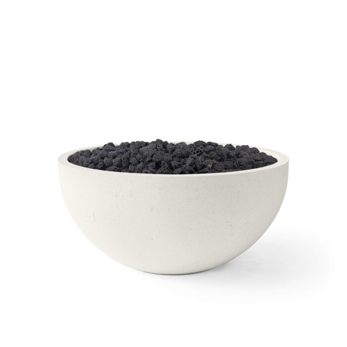 White bowl filled with black sand on a white background