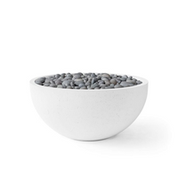White bowl filled with gray pebbles on a white background