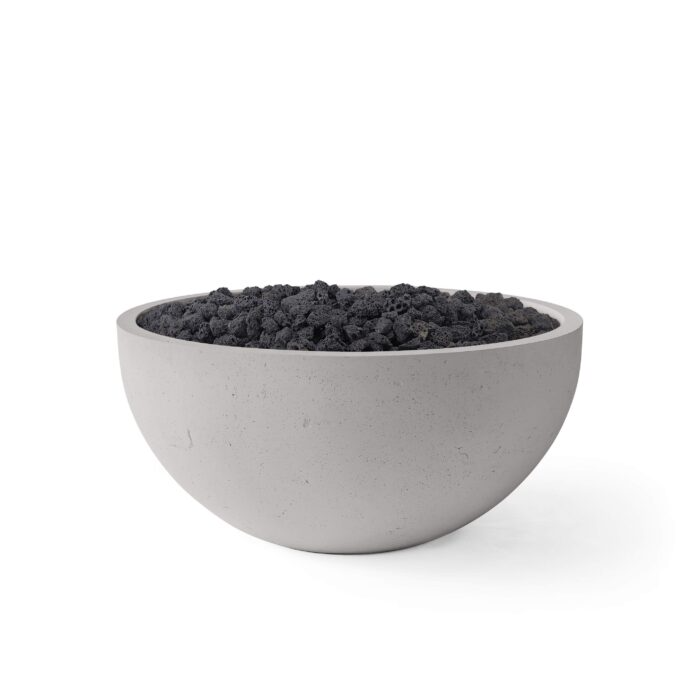 Concrete bowl filled with dark material on a white background